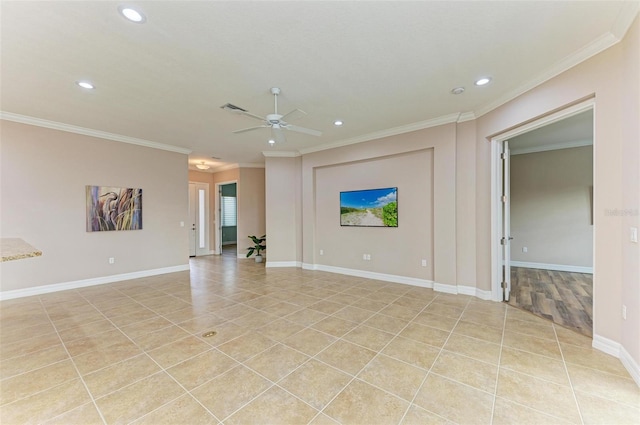 unfurnished living room with crown molding, ceiling fan, and light tile patterned floors