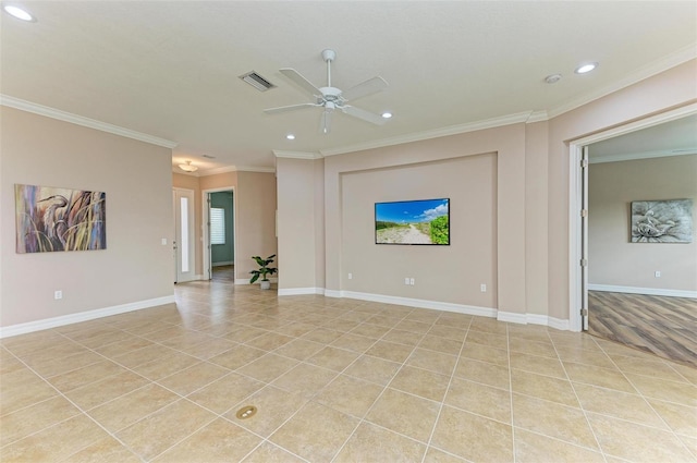 unfurnished living room with ceiling fan, ornamental molding, and light tile patterned floors