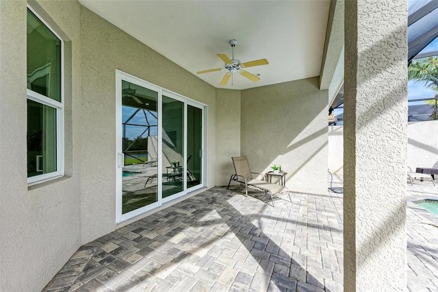 view of patio with ceiling fan