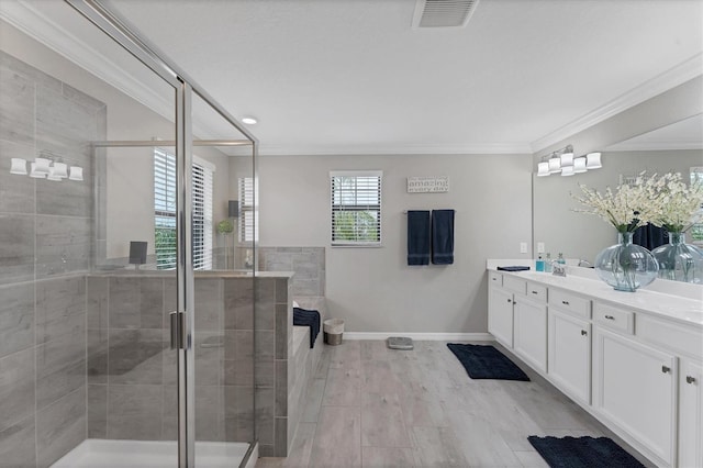 bathroom with wood-type flooring, walk in shower, ornamental molding, and vanity