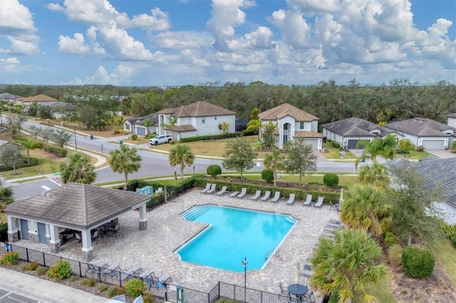 view of swimming pool with a gazebo and a patio area