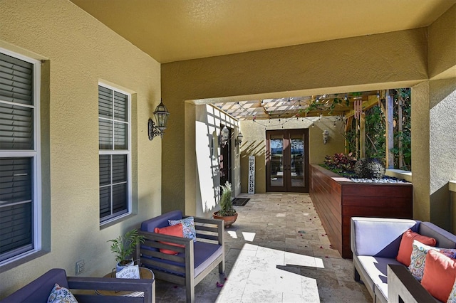 view of patio / terrace with outdoor lounge area and french doors