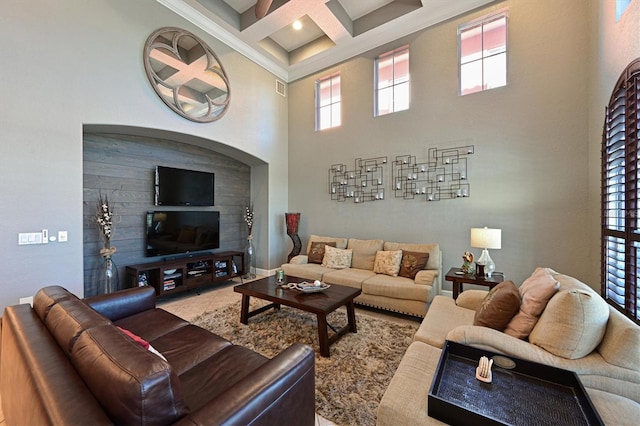 living room featuring beamed ceiling, a towering ceiling, and coffered ceiling