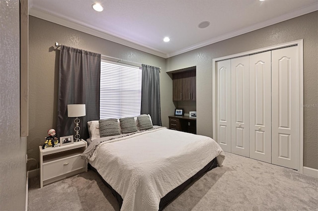 bedroom with light carpet, a closet, and crown molding