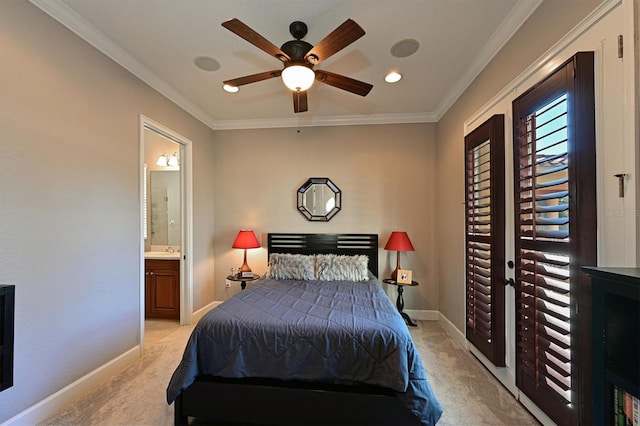 bedroom with connected bathroom, light carpet, crown molding, and ceiling fan