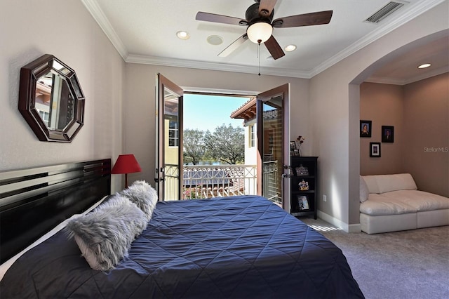 carpeted bedroom featuring access to exterior, ceiling fan, and crown molding