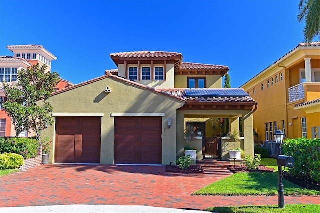 mediterranean / spanish-style home featuring central AC