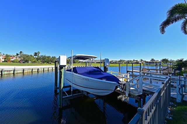 dock area featuring a water view