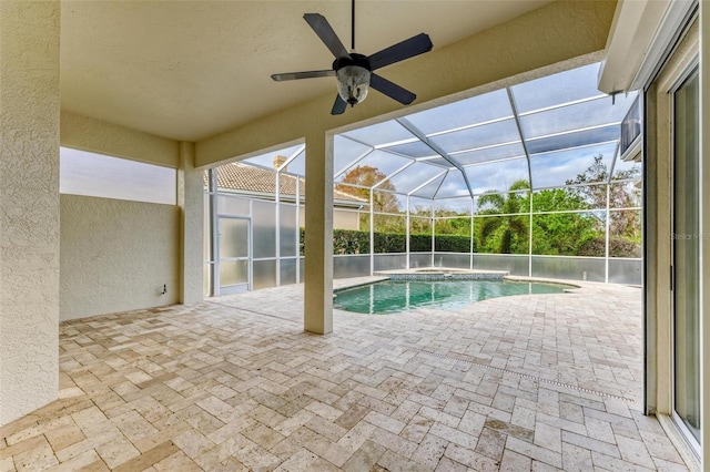 view of pool featuring a lanai and a patio