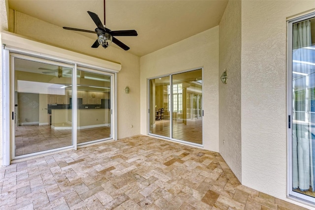 view of patio with ceiling fan