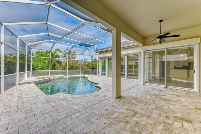 view of pool with a patio and a lanai