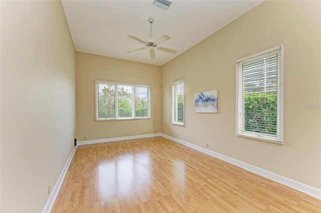 spare room with ceiling fan and light hardwood / wood-style flooring