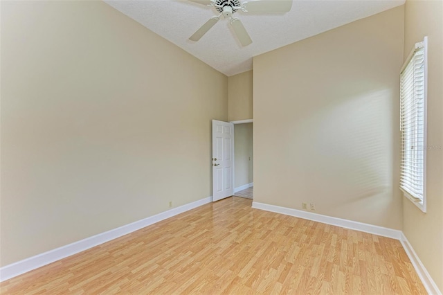 unfurnished room with ceiling fan and light wood-type flooring