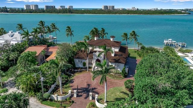 birds eye view of property featuring a water view