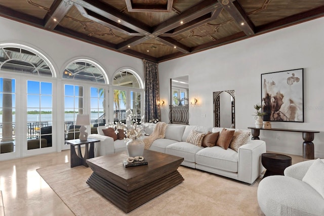 living room featuring wooden ceiling, beamed ceiling, a water view, and coffered ceiling