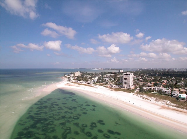 aerial view featuring a water view and a view of the beach