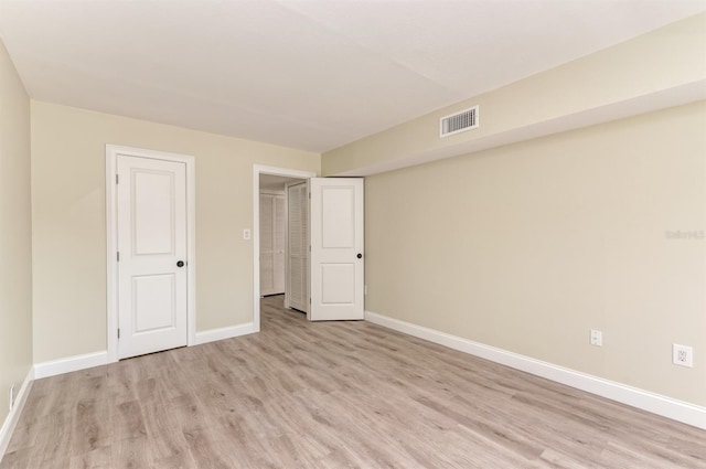 unfurnished bedroom with light hardwood / wood-style flooring