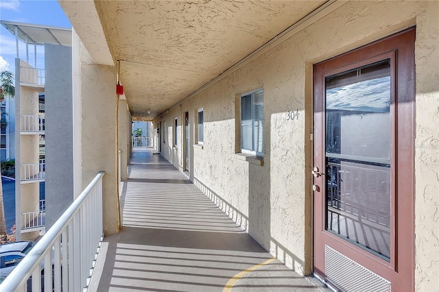 property entrance with a balcony