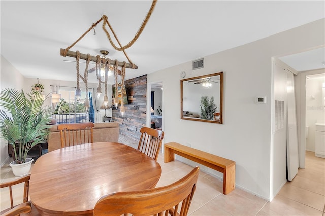 dining room featuring ceiling fan and light tile patterned floors