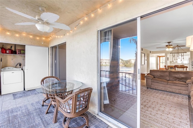 dining area featuring washer / clothes dryer, tile patterned floors, and ceiling fan