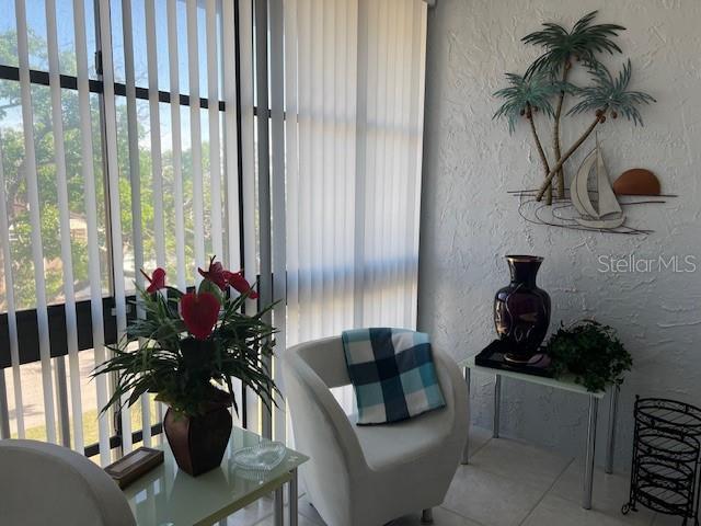 sitting room featuring tile patterned floors