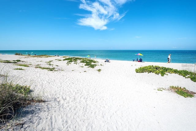 property view of water featuring a view of the beach