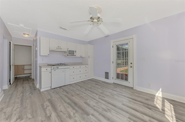 kitchen featuring ceiling fan, light hardwood / wood-style floors, and white cabinets