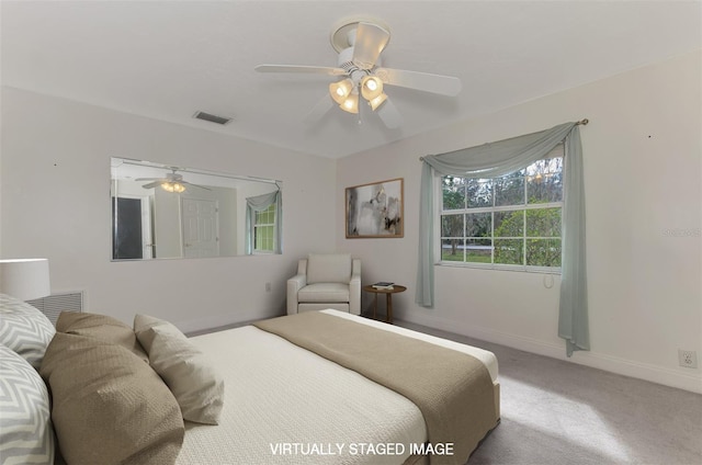 carpeted bedroom with ceiling fan