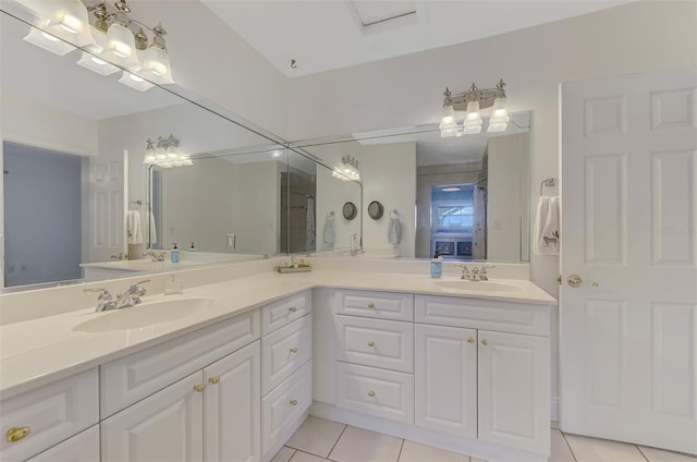 bathroom featuring tile patterned floors and vanity