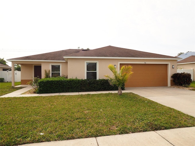 single story home with a front yard and a garage