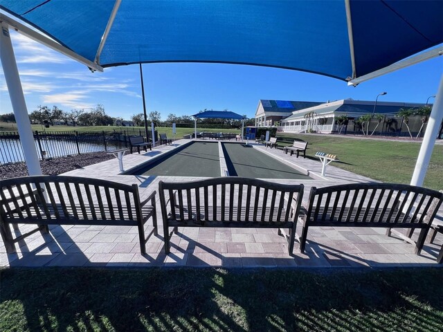 view of patio / terrace with a water view