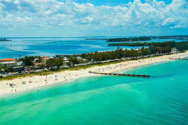 drone / aerial view with a view of the beach and a water view