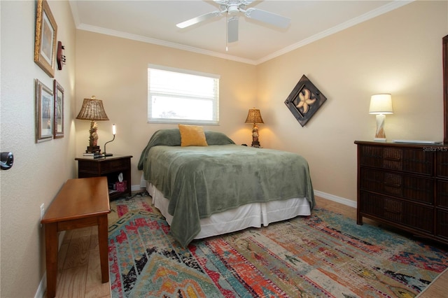 bedroom featuring ceiling fan and ornamental molding