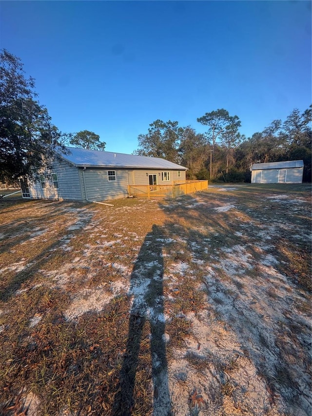 view of yard with a deck