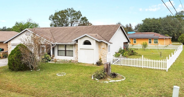 view of front of home with a front lawn