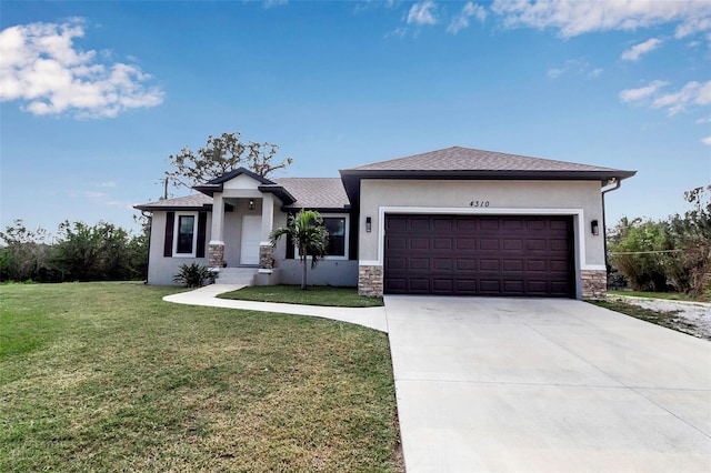 prairie-style house with a garage and a front yard