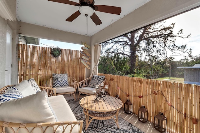 view of patio featuring ceiling fan