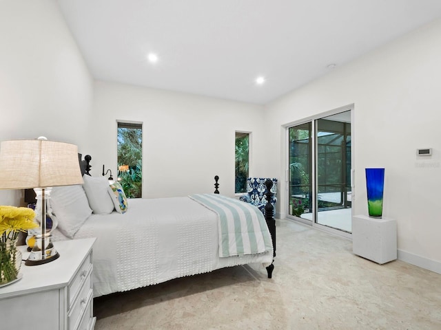 bedroom featuring multiple windows, access to exterior, and recessed lighting