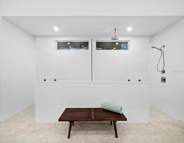 bathroom featuring a shower and recessed lighting