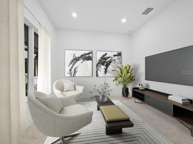 living room featuring carpet, visible vents, and recessed lighting