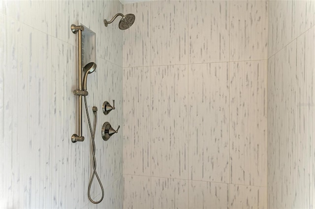 details with a tile shower