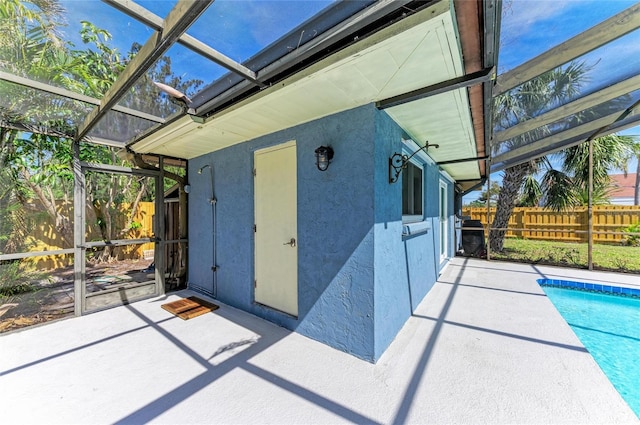 exterior space featuring fence and a fenced in pool