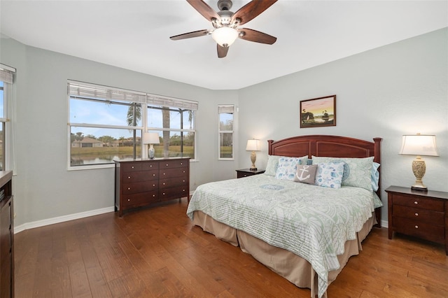 bedroom featuring hardwood / wood-style flooring and ceiling fan