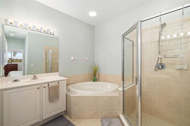 bathroom with tile patterned flooring, plus walk in shower, and vanity