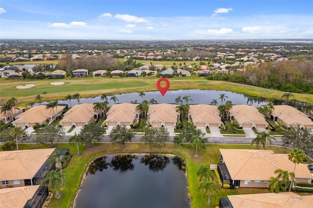 aerial view featuring a water view and a residential view