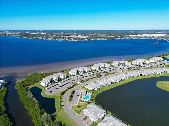 bird's eye view with a water view