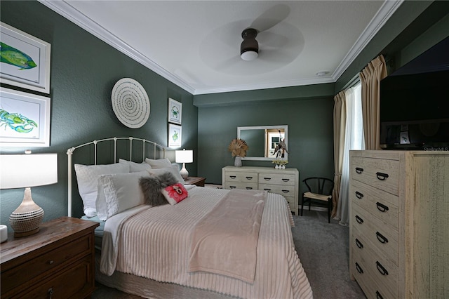 bedroom featuring dark colored carpet, ceiling fan, and crown molding