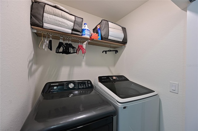 laundry room with washer and clothes dryer