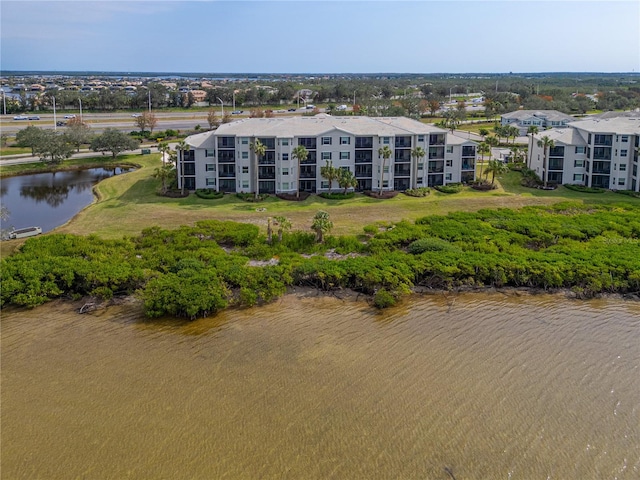 bird's eye view with a water view