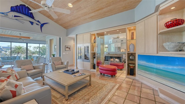 tiled living room with wood ceiling, ceiling fan, and high vaulted ceiling